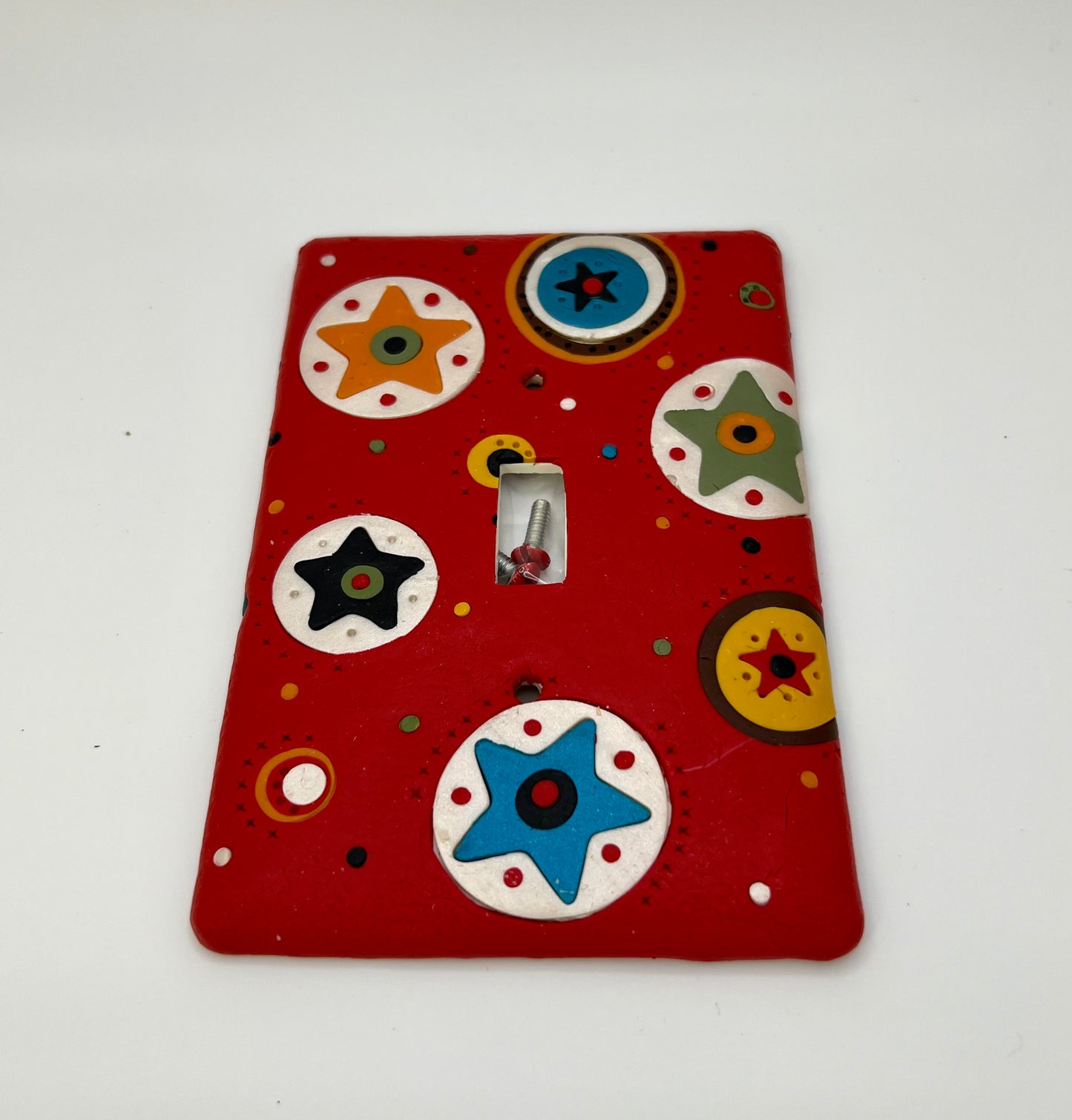 Brick Red with Circles and Colorful Stars